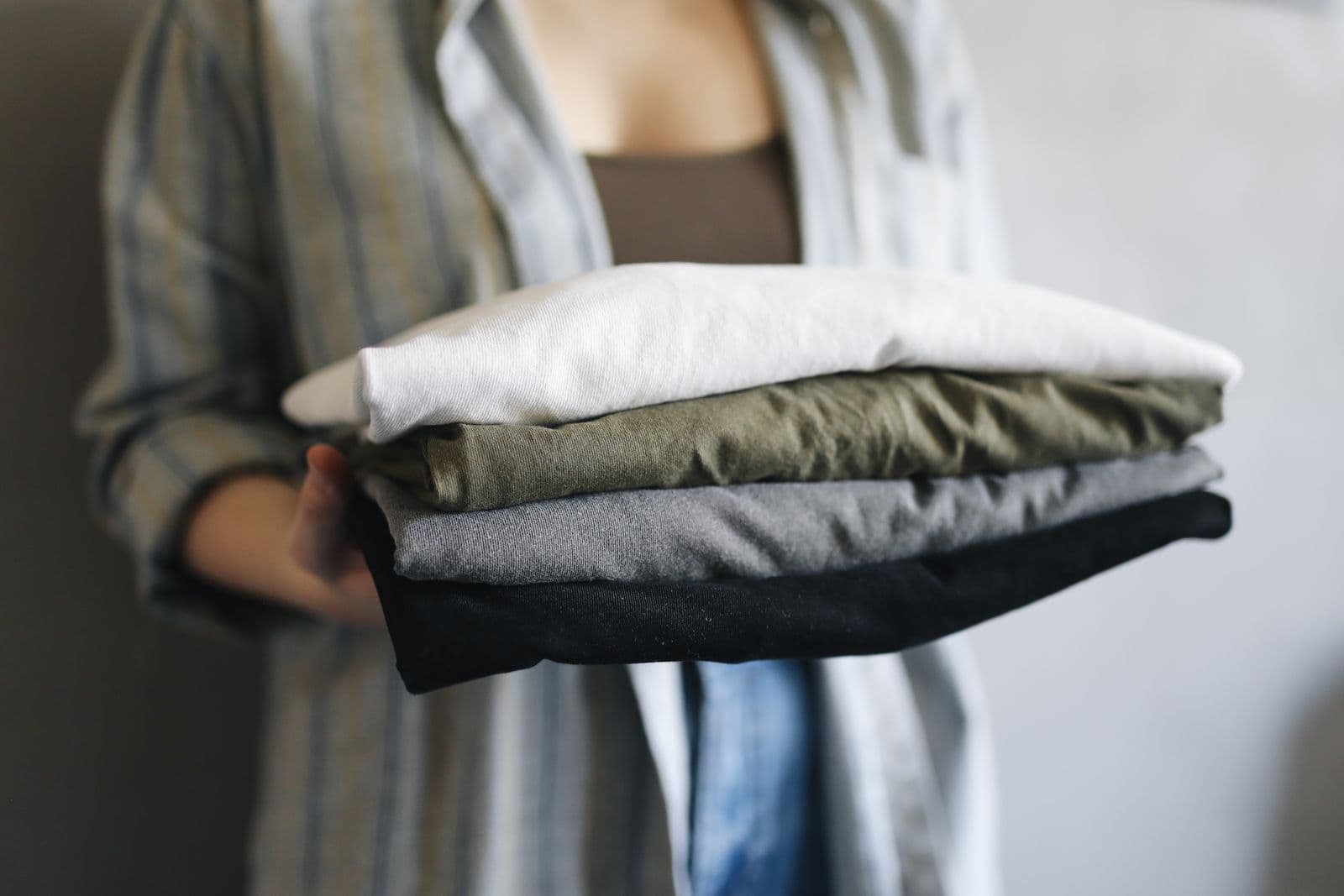 A stack of finished folded t-shirts