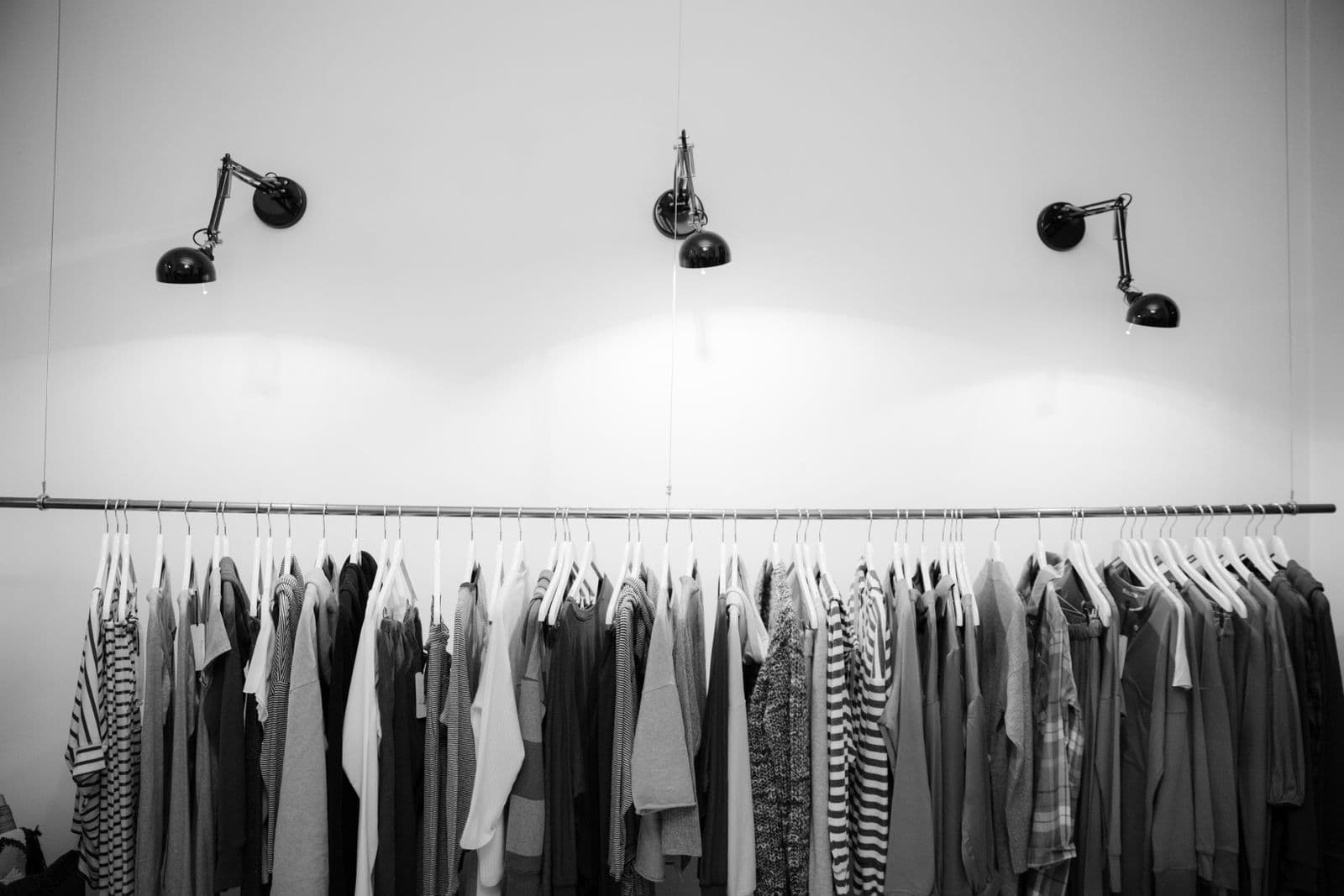 Menswear rail of shirts and knits